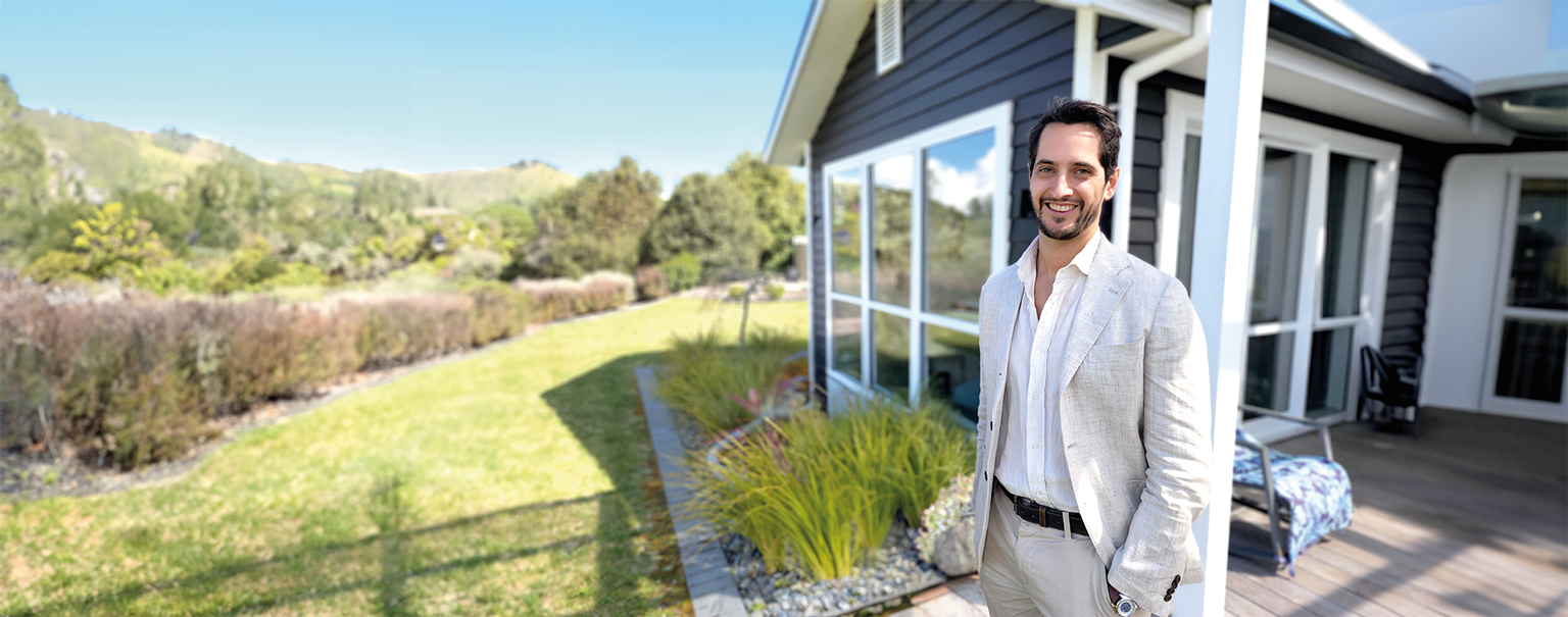 Ben Dellabarca outside a New Zealand home